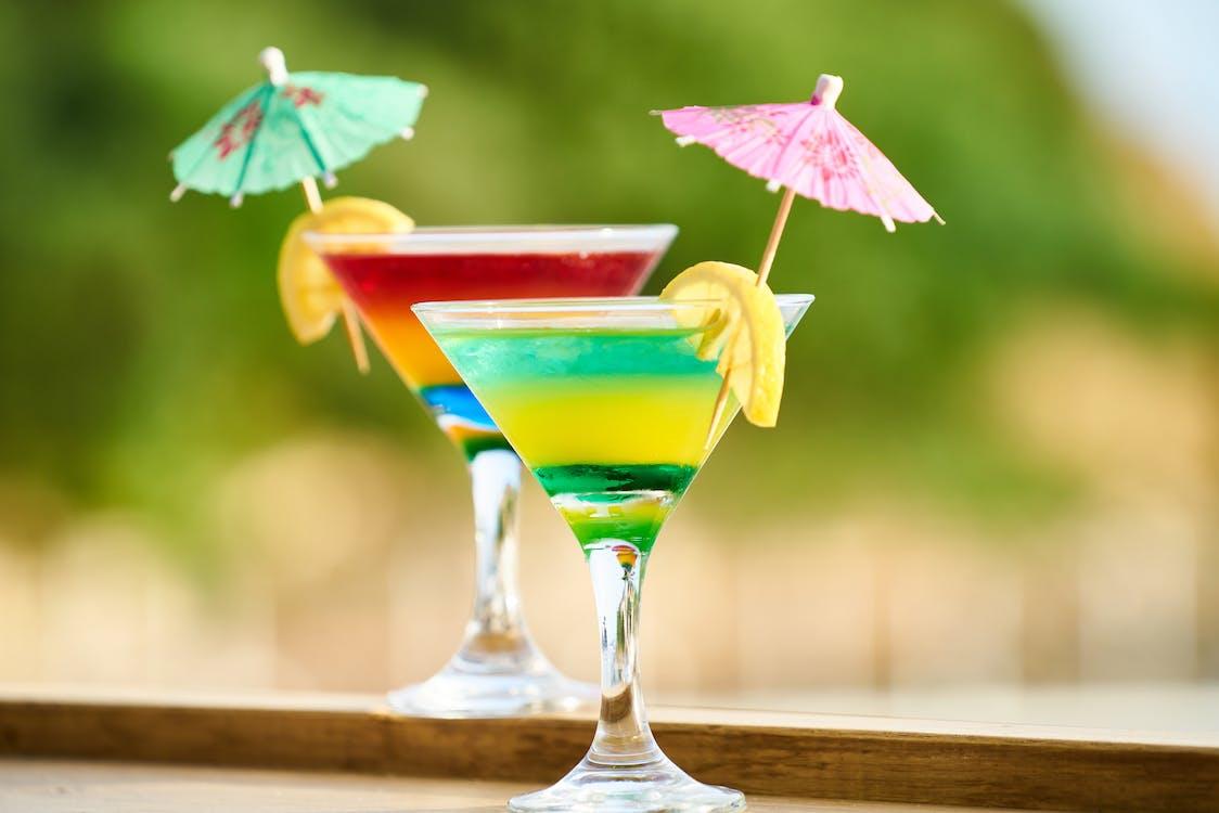 Two layered cocktails in martini glasses